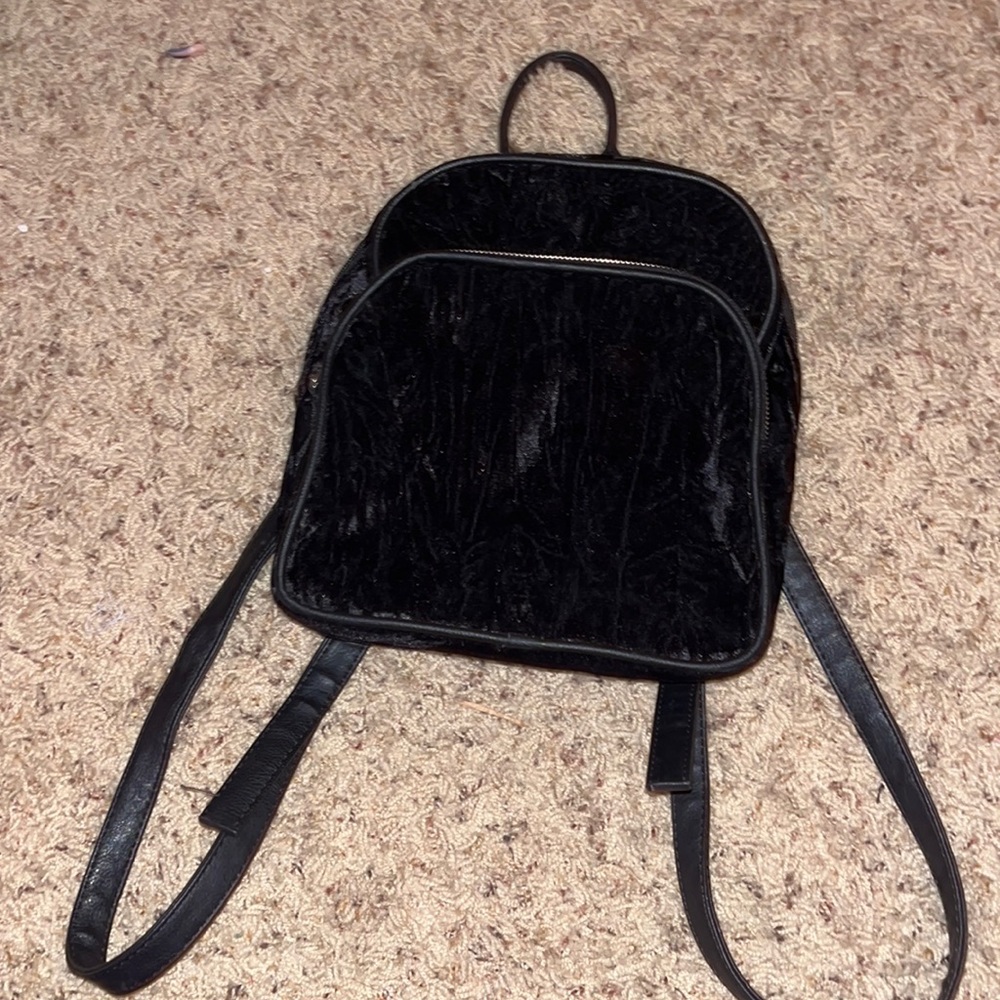 satire tiny backpack